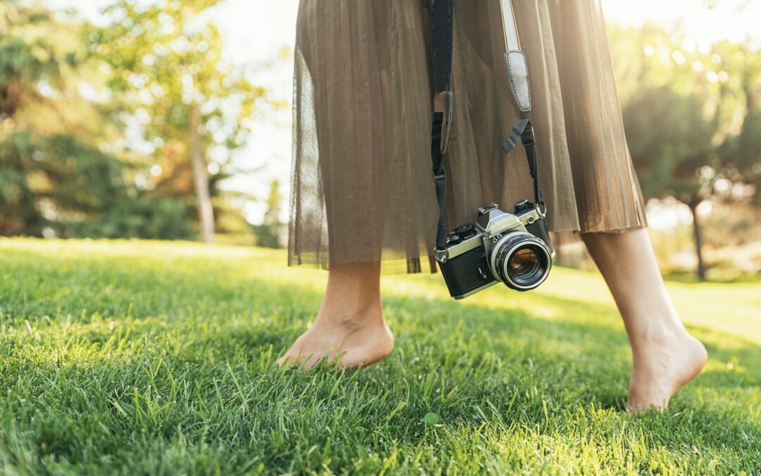 Close up of a photographer with her camera.